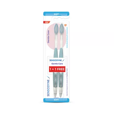 Gentle care toothbrush with bonus extra brush.