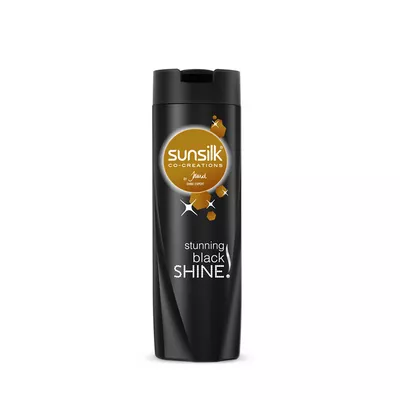 Travel-size black shine shampoo.